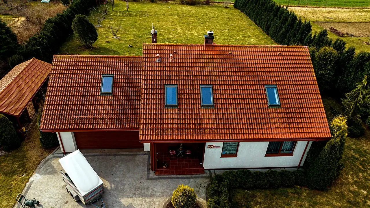 Dach domu i garażu od frontu: przed pracami – Bierkowo k. Słupska, CleanTECH